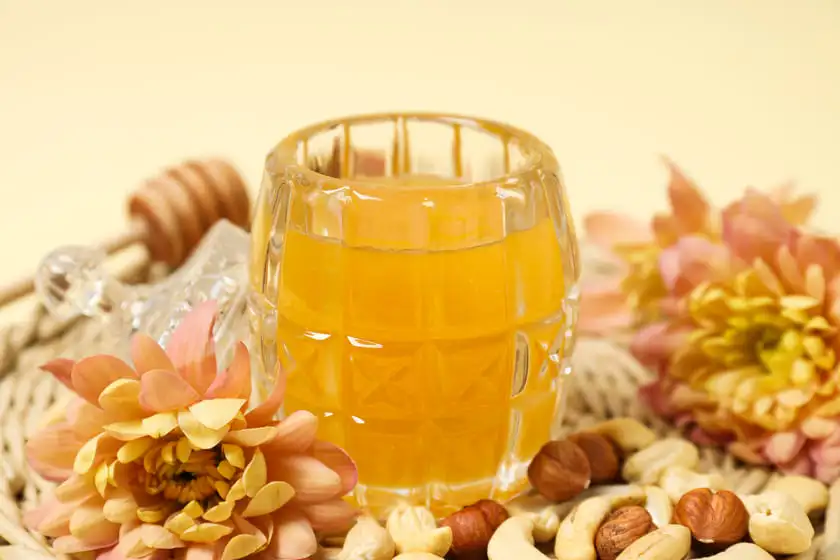 tasty and sweet food honey with nuts