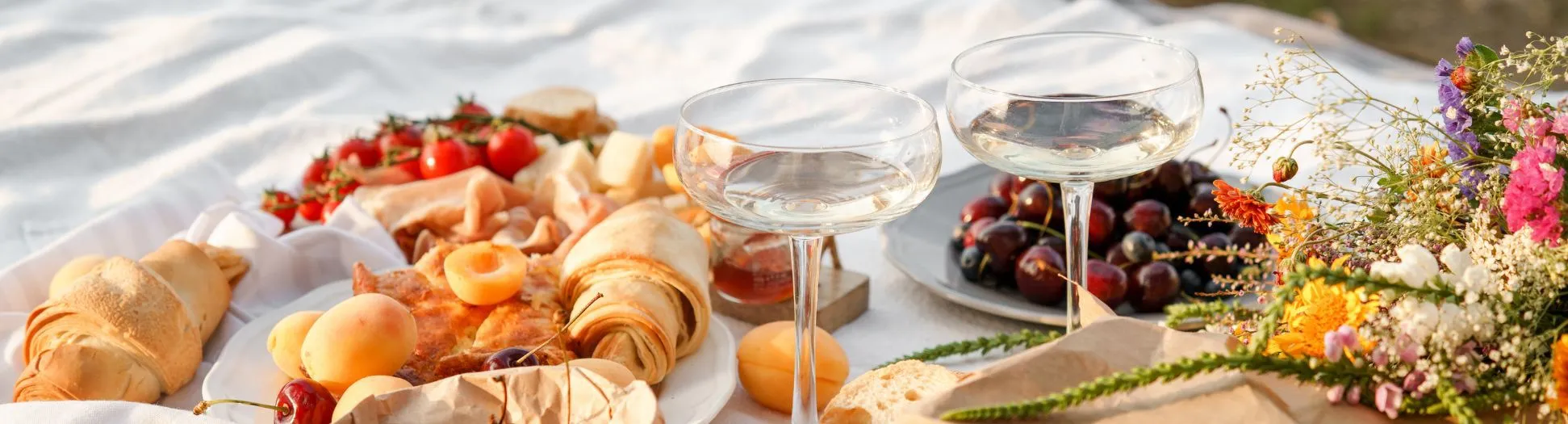 picnic with wine and food on a summer sunny day